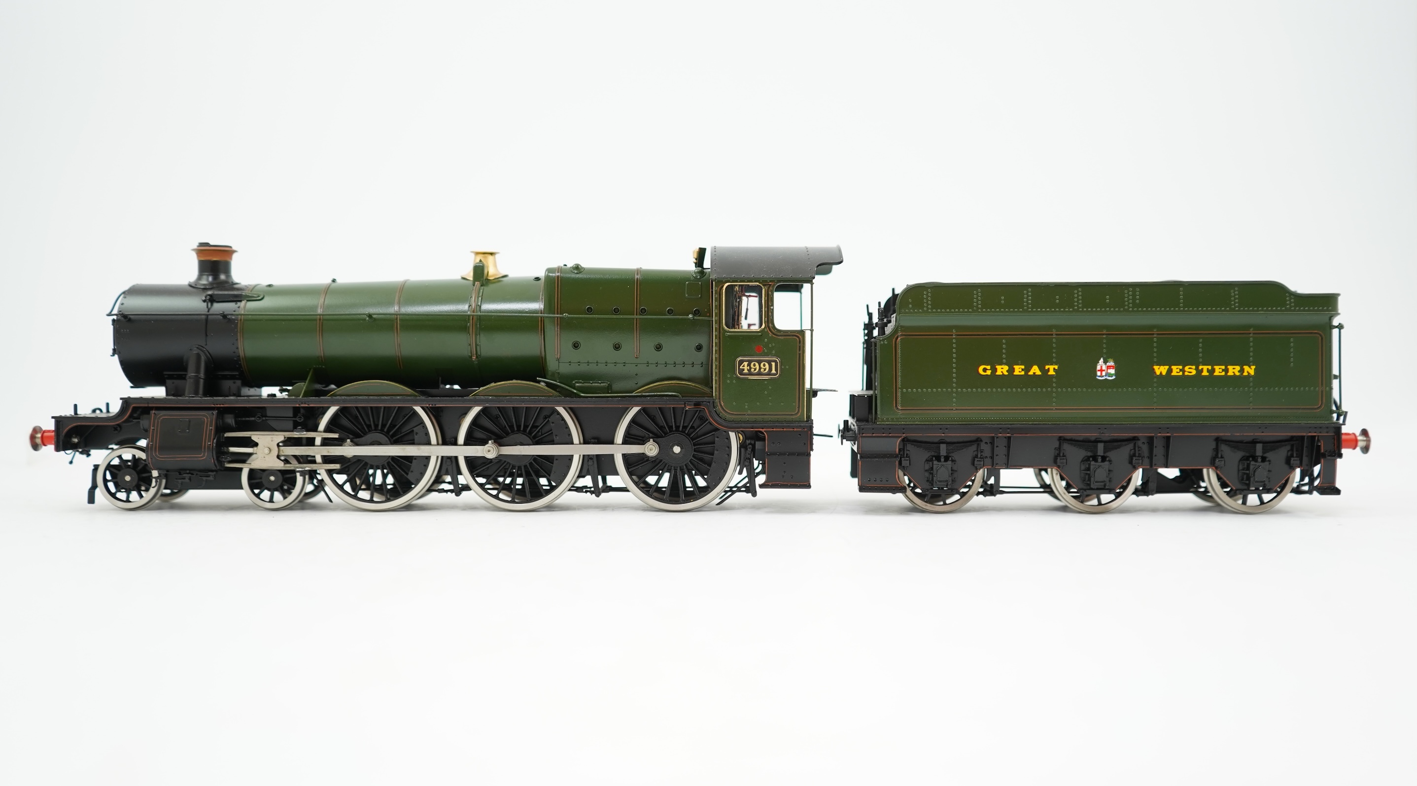 An 0 Gauge Made by Sancheng, China, model of GWR Hall Class, Cobham Hall 4991, 4-6-0 tender locomotive, powered for two rail operation.